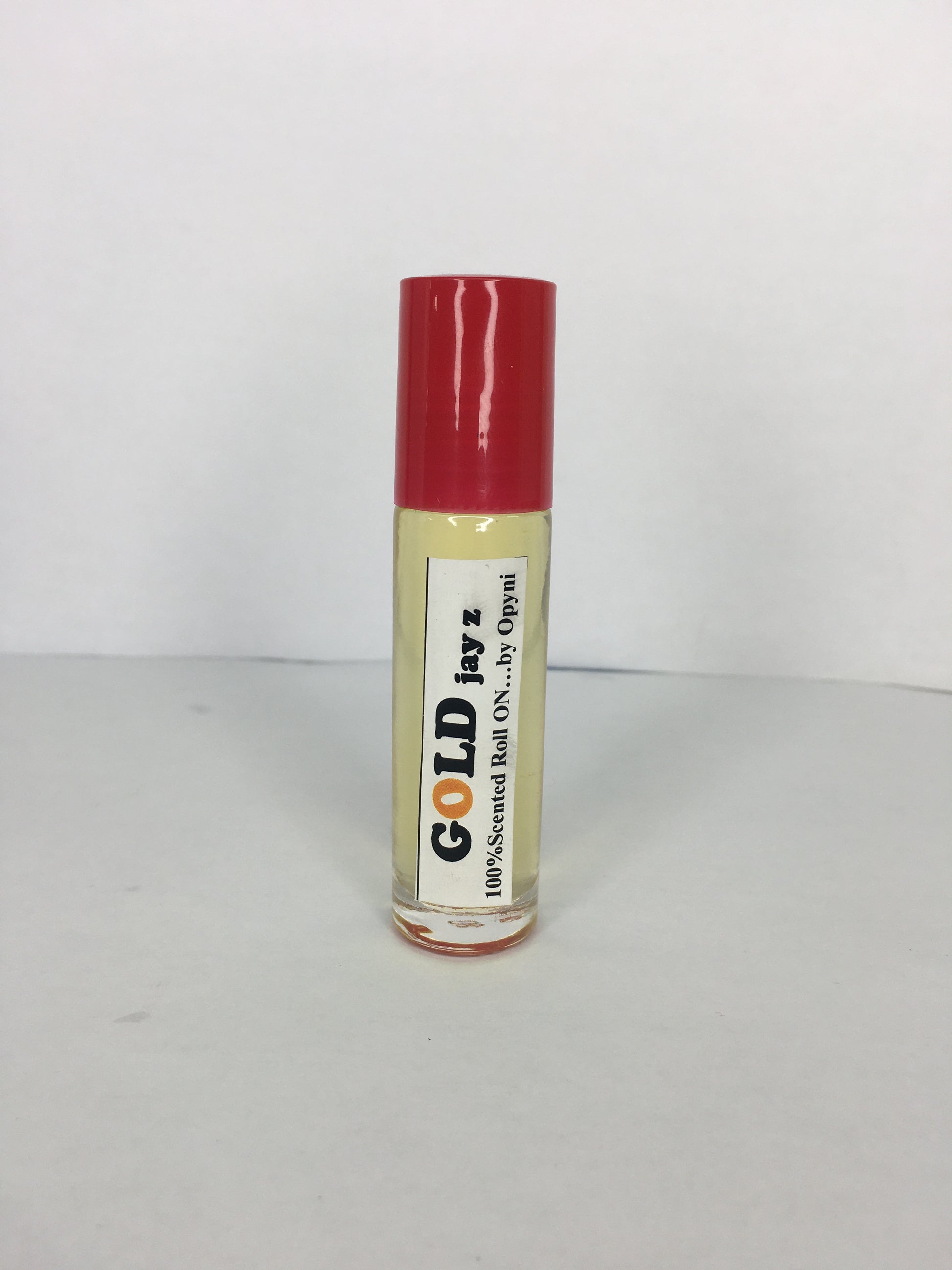 Roll-on labeled Jay Z Gold with brand name Opyneye on a white background
